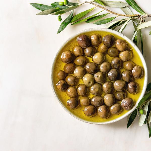 olives plated with olive branch